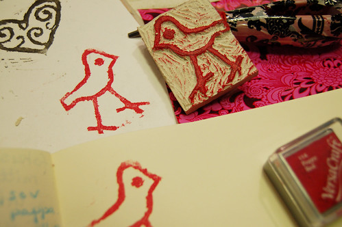 Carved stamp with a bird