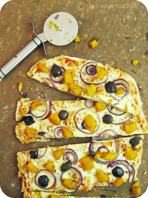 Butternut, red onion and olive pizza on rye base b2-w