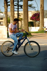 Text Messaging + Smoking + Riding Bike by photomagister