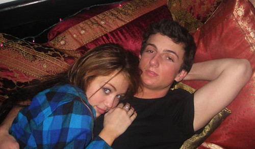 Miley Cyrus in Bed with Guy