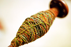 plied yarn on spindle
