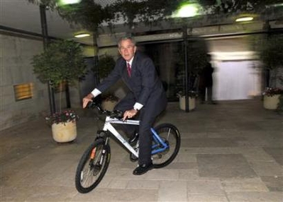 President Bush rides a special edition of an Israeli made bicycle