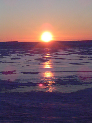 Last Feb's sunset...reflecting on frozen pond in front of my house