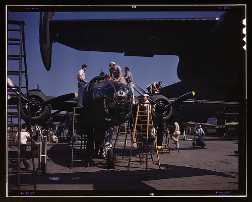 Warbird picture - On North American's outdoor assembly line, employees rush a B-25 to completion, N[orth] A[merican] Aviation, Inglewood, Calif.