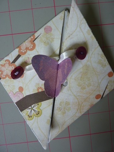 Wedding card By gently untying the ribbons and opening up the triangular 