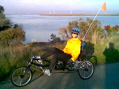 Leaping Woman on her recumbent trike at Shoreline Park