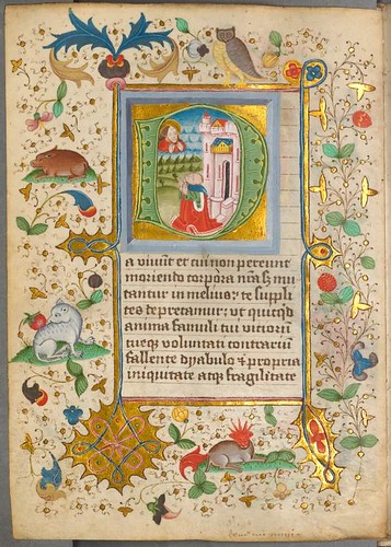Illuminated letter with scenic infill, text and surrounds of stylised animals and decoration