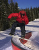 A snowboarder boardslides a jib in Gålå, Norway