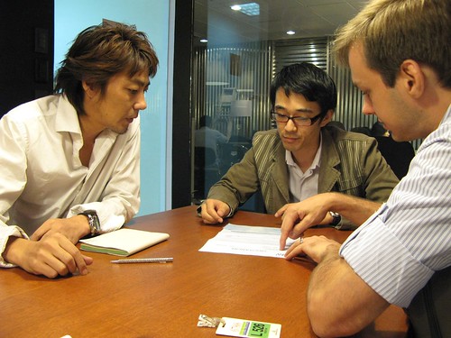Kimachi, Hiro and Jeroen discussing Pepper Lunch layout