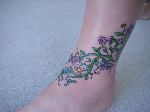 ankle flower and vine tattoo my leg is still a bit swollen