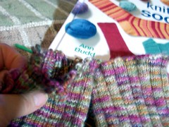 doing the fix to the cuffs to get more yarn