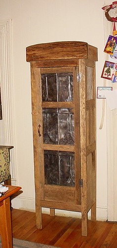 Cabinet with old tins
