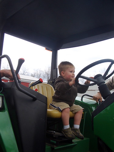 Henry driving his first John Deere!