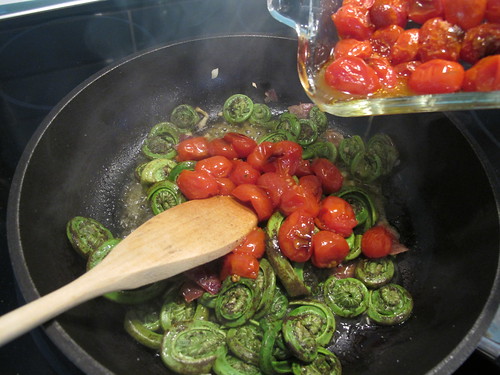 Adding tomatoes to fiddleheads