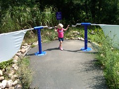 Anna "flying" at Durham museum of life and science