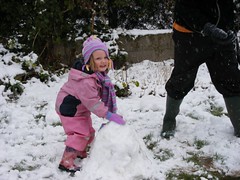 Martha persists with trying to make a snowman