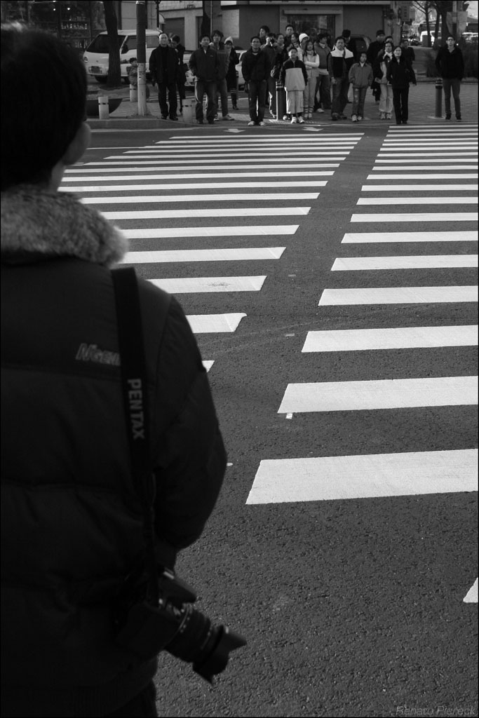 pentax dude about to cross the road