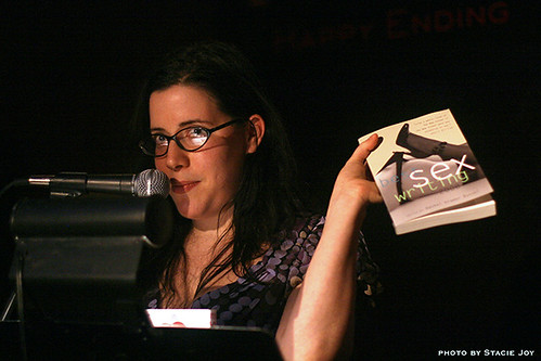 Me holding up Best Sex Writing 2008 at Blogger Sex Night at In The Flesh