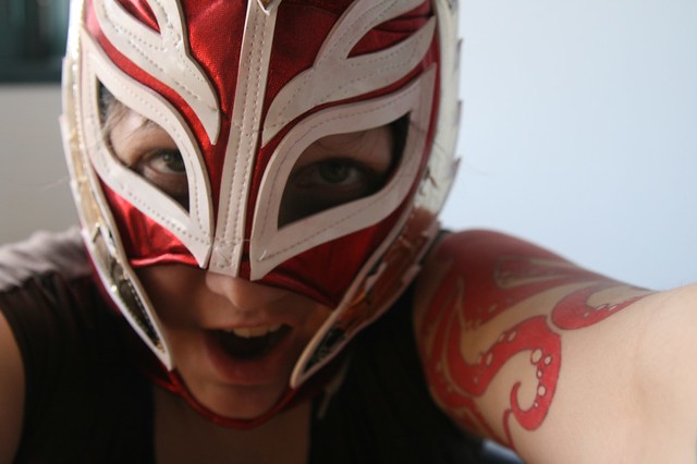 Wearing a Lucha Libre style mask