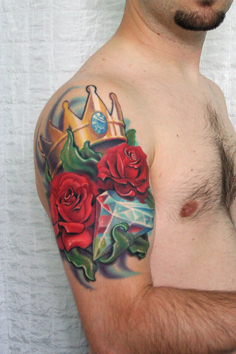 Jewel Crown Flower Tribal Tattoo in Arm