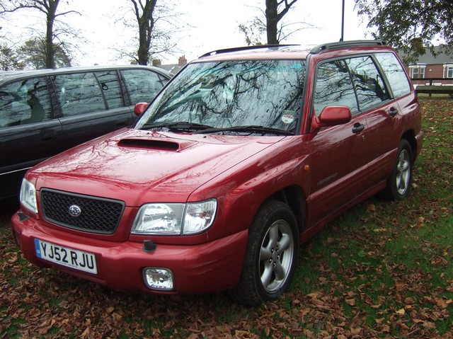 2002 red subaru forester