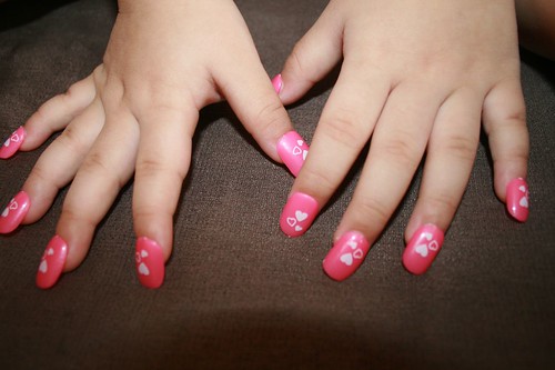pretty pink heart nail design