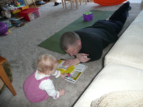 Ella, showing daddy an article in scientific american