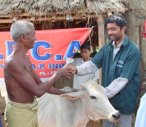VSPCA aid worker and villager