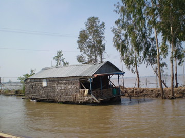 Boat to Cambodia floating house