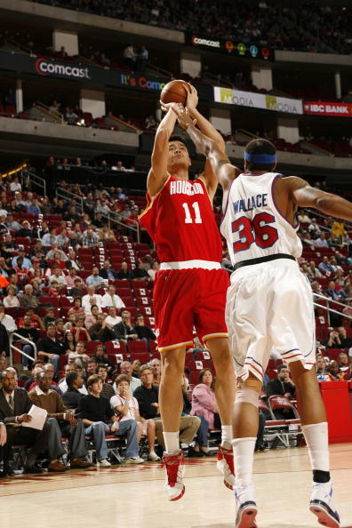 Yao Ming shoots over Detroit's Rasheed Wallace Wednesday night.  Yao scored 21 points, grabbed 13 boards, had 3 assists, and blocked 4 shots.  He also hit some big shots in the fourth quarter that were instrumental to a close 80-77 win.