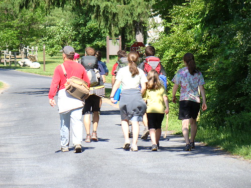the Flynn family walking up to the Ironmasters hostel after a 6+ mile walk with us