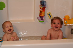 Both boys in the tub