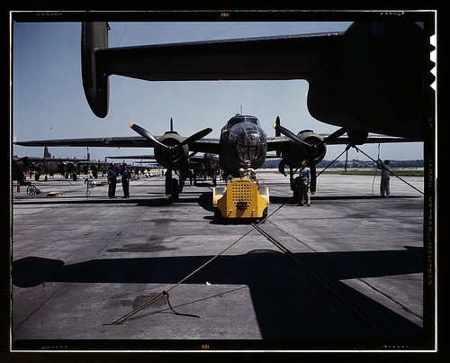 Warbird picture - A fast, hard-hitting new A-20 [i.e., B-25] attack bomber is brought for a test hop to the flight line at the Long Beach, Calif., plant of Douglas Aircraft Company