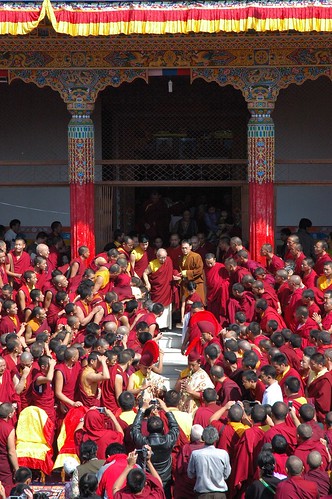 His Holiness Jigdal Dagchen Sakya coming out of Tharlam Monastery with his son HE Zaya Sakya Rinpoche and grandsons to reception of lamas monks nuns laypeople students Boudha Kathmandu Nepal by Wonderlane