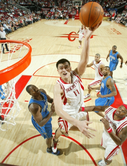 Yao Ming shoots a jump hook in the lane against Orlando on Wednesday, December 19th.  Yao finished with 19 points and 17 boards in a game where the Rockets shot 34% as a team and lost 97-92.