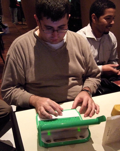 Ross Karchner plays with the OLPC X0-1