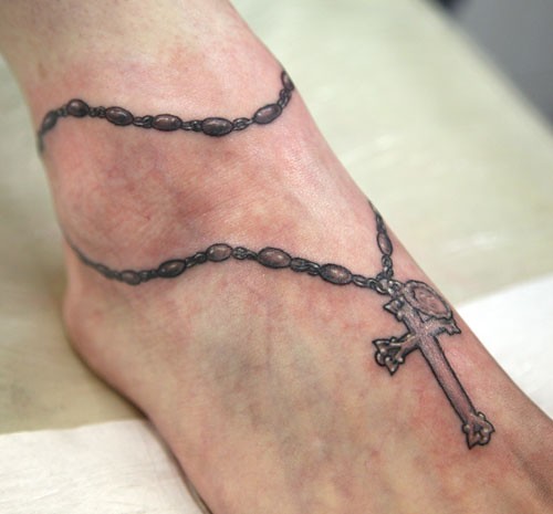 a name tattooed on a foot Tattooed at The Tattoo Studio Crayford