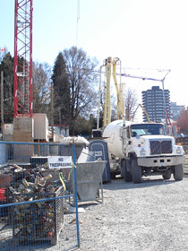 A truck emerges at the Cambie-Broadway construction site