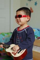 Posing with ukelele and new sunglasses