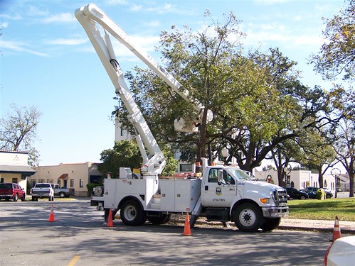 Christmas lights going up on the square in Seguin