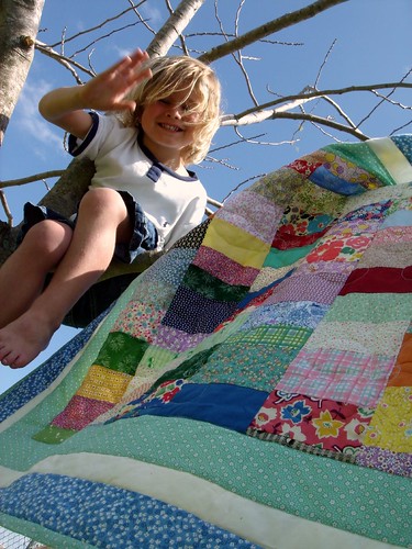 lap quilt with K. in a tree