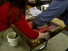 Dee and Helen screen printing the Waygood Art Boutique shopping bags