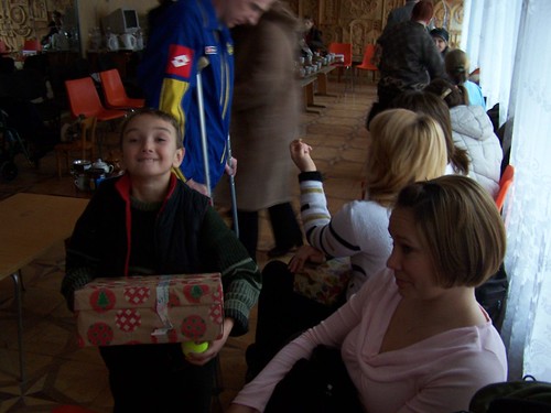 Maxime getting a present at church for old New Years