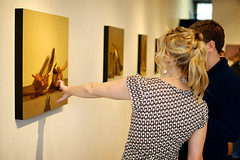 Erin, discussing one of her paintings