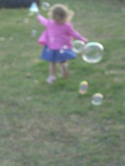 All a girl needs is bubbles.