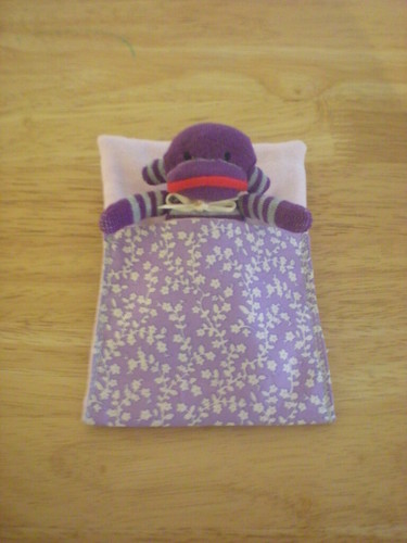 mini sock monkey in sleeping bag