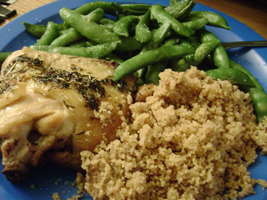 wine-braised chicken, whole wheat cous cous, steamed sugar snap peas