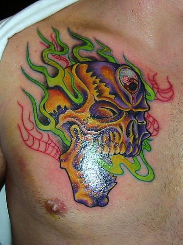 Skull tribal full colored chest tattoo