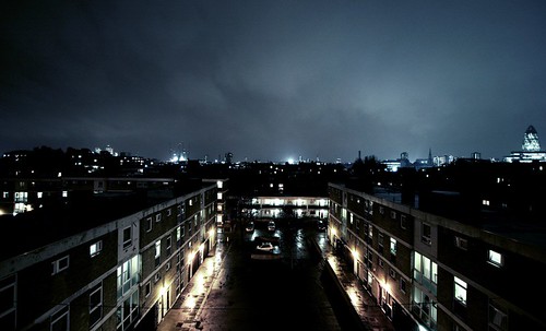 courtyard-nighttime London skyline 