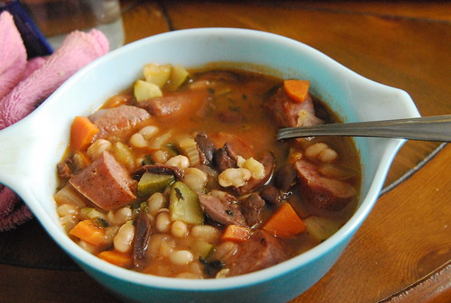 White bean and olive soup with ethical farmer sausage